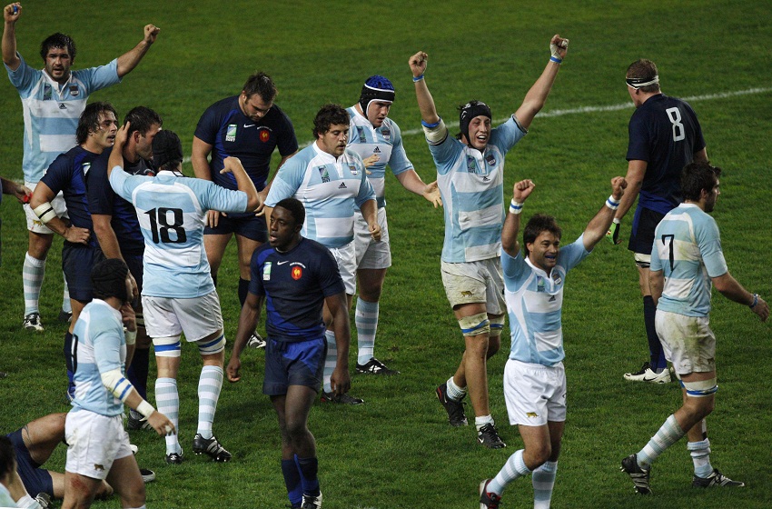 Argentina players celebrate after they beat France in third-place playoff Rugby World Cup match in Paris